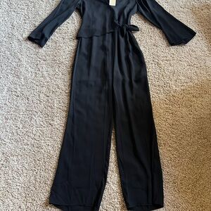 Michael Kors jumpsuit size 4. New with tags